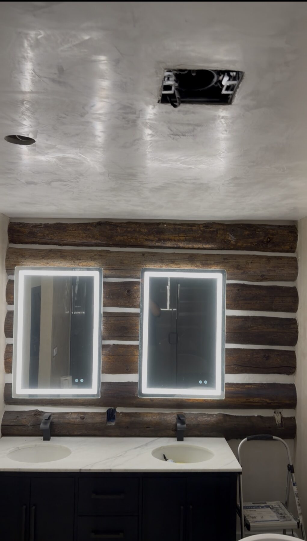 Smooth plaster finish in a bathroom remodel
